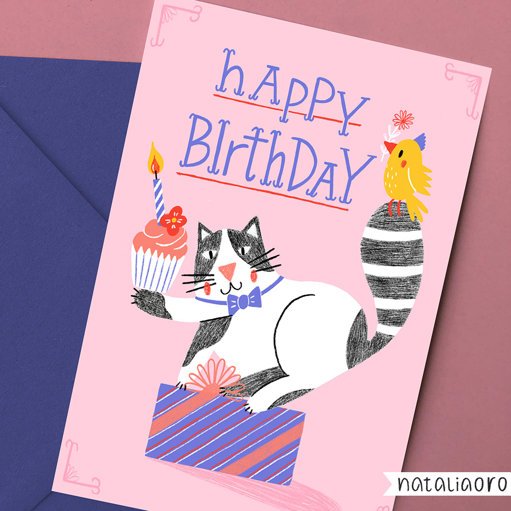 Birthday card with a cat holding a cupcake on a mockup by nataliaoro